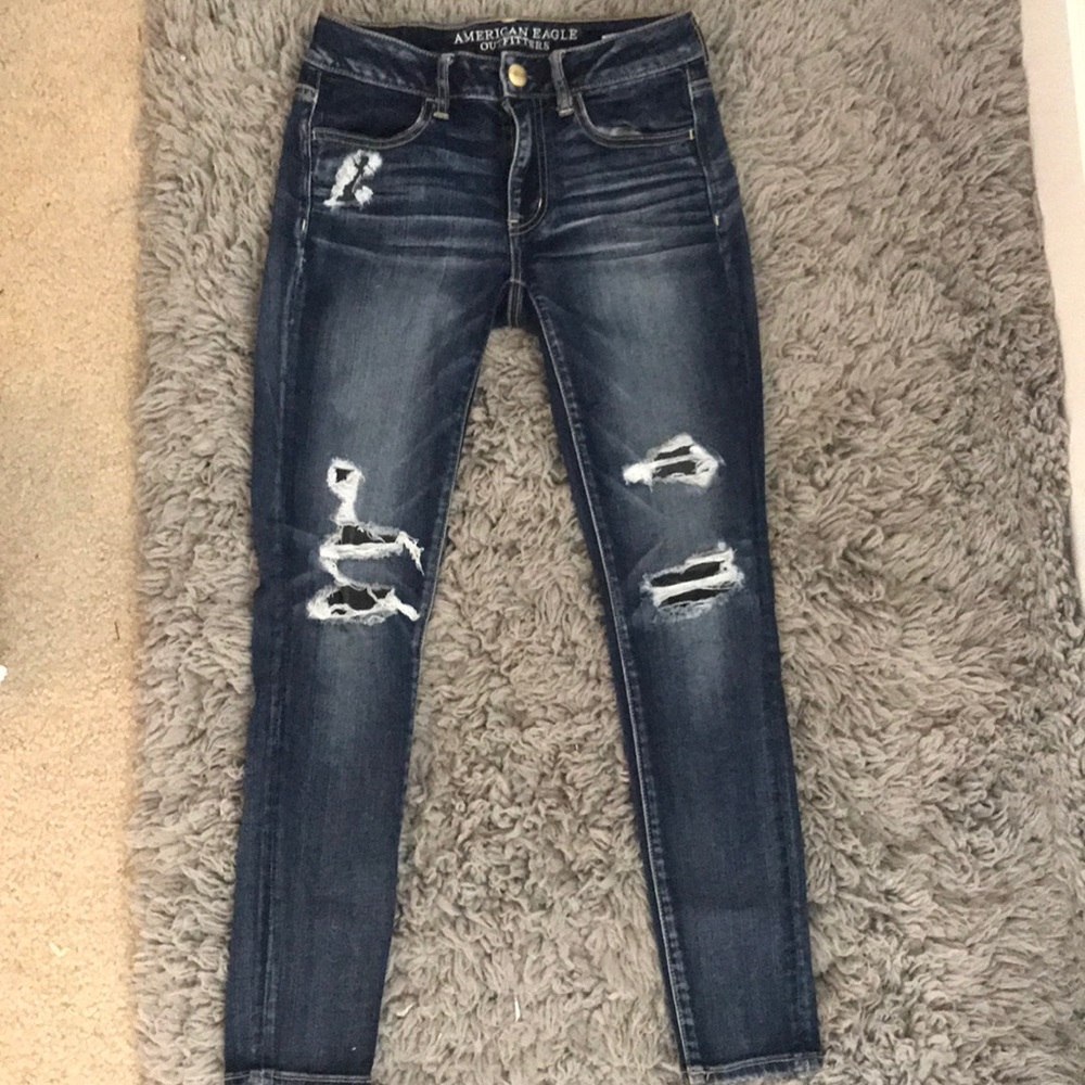 American Eagle distressed dark denim jeggings.